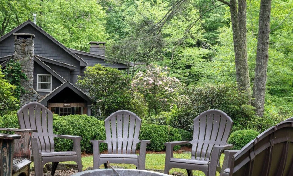 Mirror Lake Cabin | A 100-Year-Old Mill. A River That Wraps the House. A Water Wheel Still Turning | The Millhouse