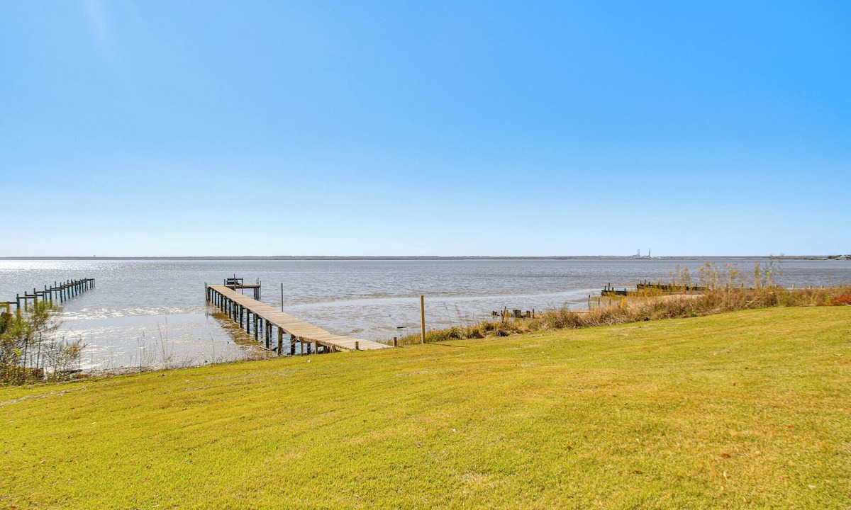 Florida Panhandle House | Bayfront Home in Pace w/Dock & Hot Tub, Near Ramp