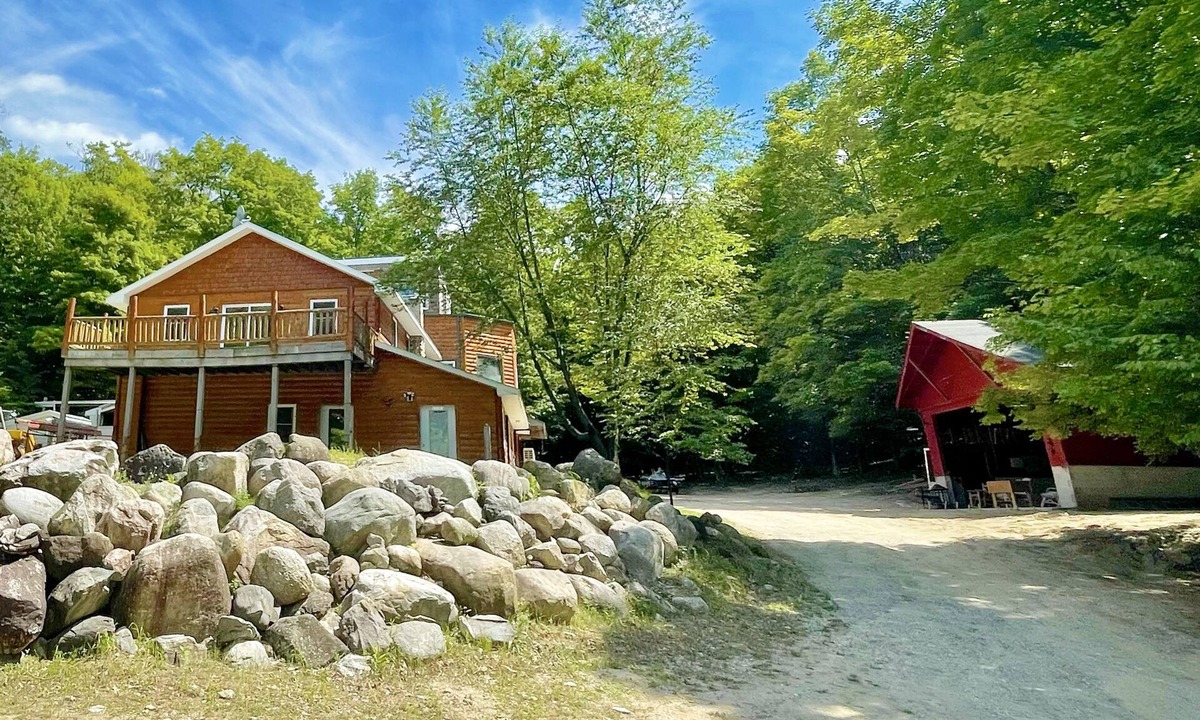 Central Lake House | Close to Torch Lake. Event and Sports Barn. Great golf nearby. Sleeps 13+. Bunks