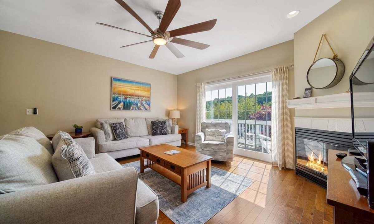 Saugatuck Condo | Experience comfort in this 3-bedroom townhome with stunning water views in downtown Saugatuck.