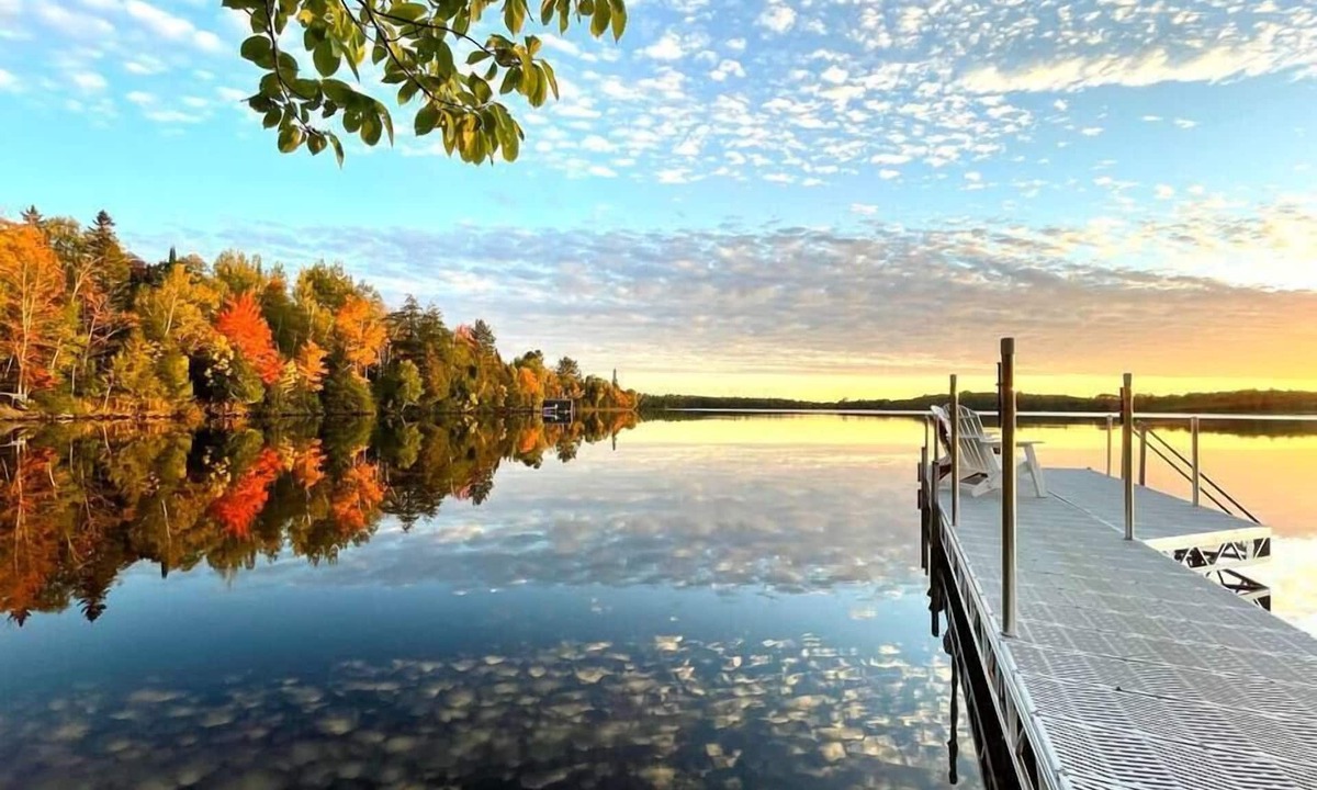 Presque Isle Cabin | Private Lakefront Stay with Beautiful Sunset Views, Kayaks, & Kid’s Area