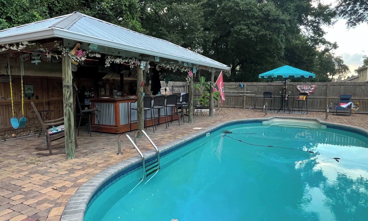 North Northwest Pensacola House | Private Oasis with Pool & Tiki Bar