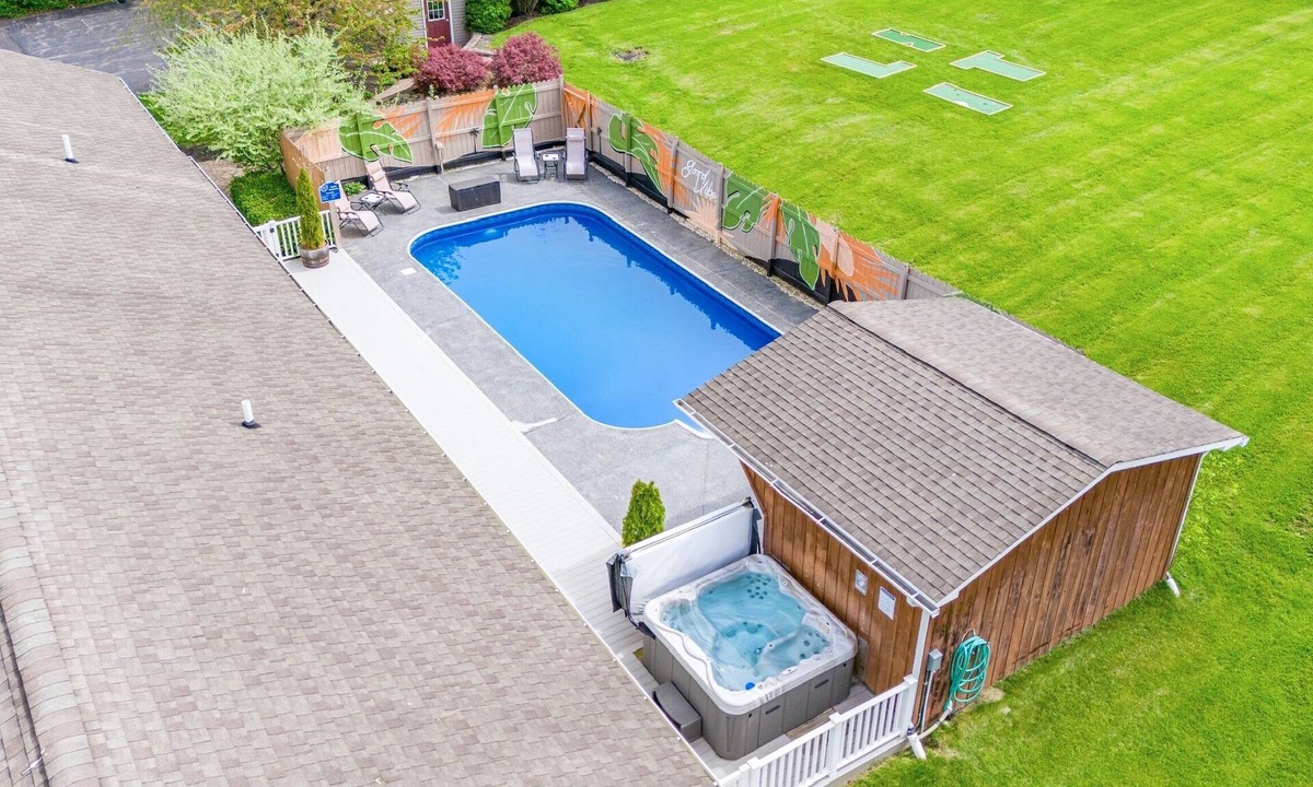 Town of Milo House | Relaxing Lakeview Retreat! Pool, Hot Tub, Firepit, Gameroom Perfect for Groups,