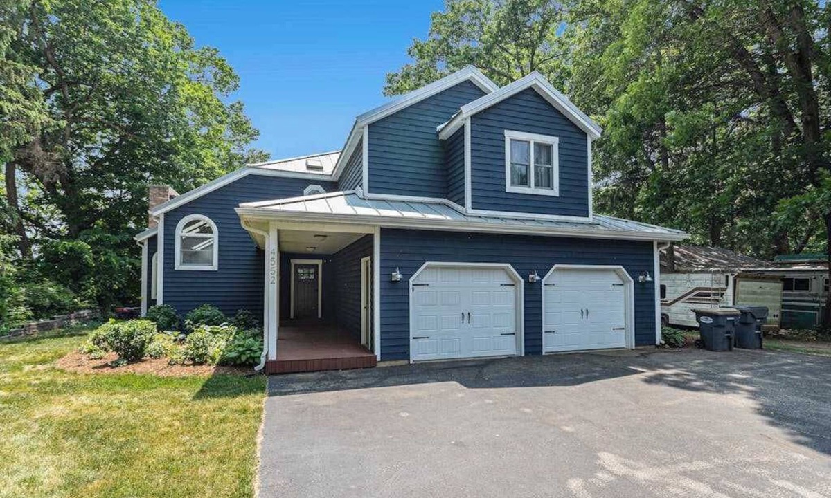 Berrien Springs House | Serene lakefront retreat with an expansive deck, dock access, game room, & AC