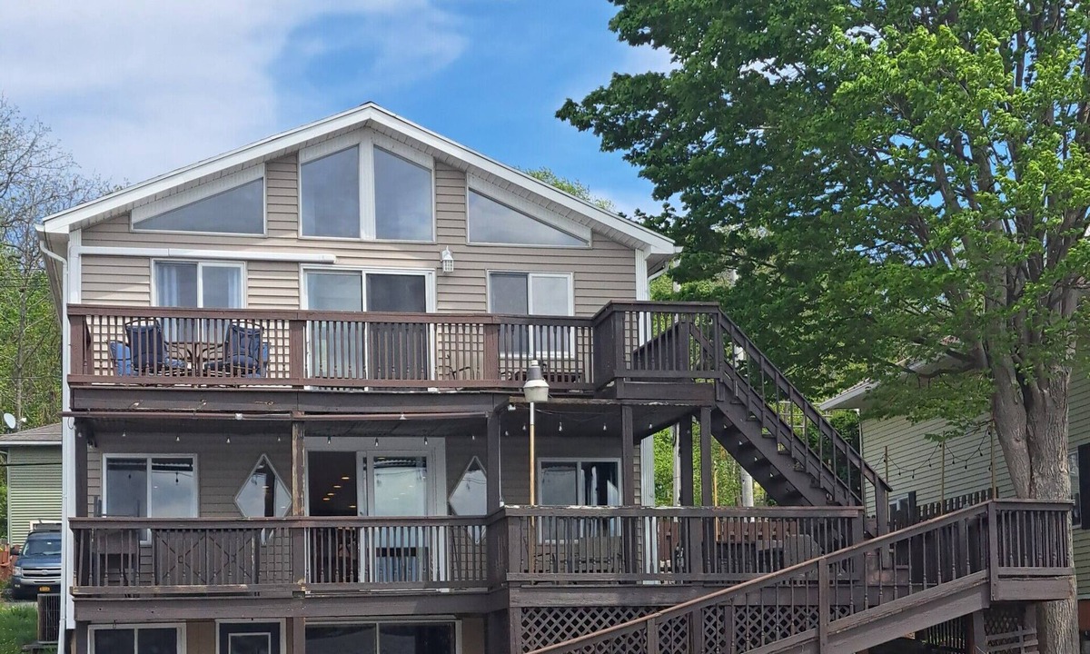Conesus House | Sunset Lakefront Family Retreat - Dock, Hot Tub, Kayaks - Sleeps 12