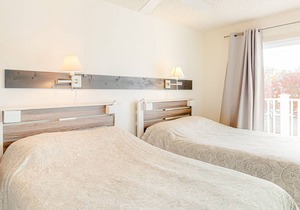 Air-Conditioned Condo w/ Patio, Balcony, WiFi & Shared Pool - Walk to the Beach