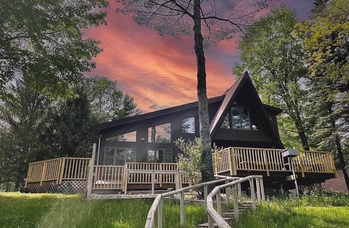 Thompsonville Cabin | A-Frame Cabin on Betsie River – Private Dock & Fishing Near Crystal Mountain