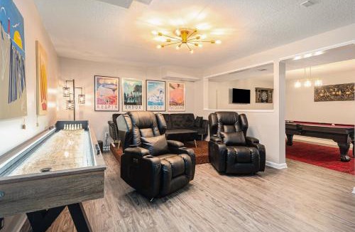 Muskegon House | ATLAS - Whole House - 5BR 2BA - Hot Tub - Game Rooms - Theater - Fenced Backyard