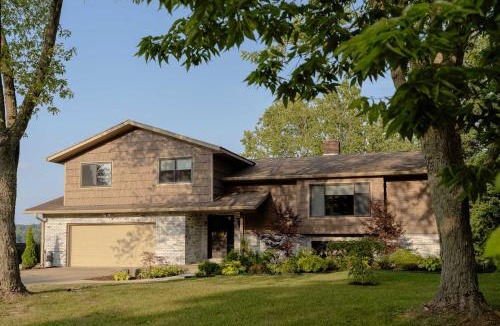 Berrien Springs House | Bluffview on the River with a hot tub sauna pool table and more