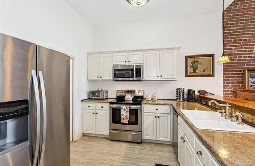 Warrington House | Bring the pups & boat! Historic 2 bed, 2.5 bath waterfront town-home with dock.