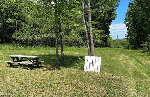 Westport RV Rental | Campsite 1. A charming campground in Wadhams perfect for your outdoor getaway.