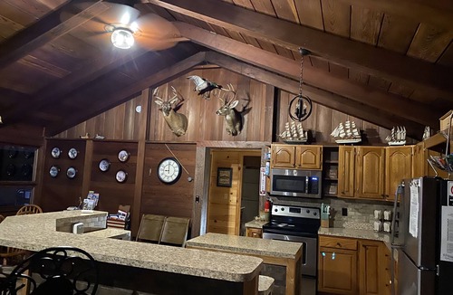 Nancy Cabin | 🤩 Charming Lake Side Retreat perched above scenic Faubush Creek.