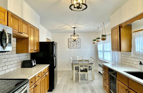 West End House | Comfortable furnishings, central air conditioning, covered patio and outdoor lounge furniture