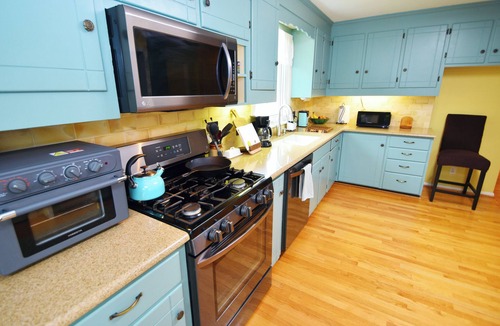 Penfield House | Comfortable Rochester Area Retreat Heated Pool, Hot Tub, 2 Kings & Fenced Yard