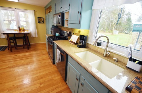 Penfield House | Comfortable Rochester Area Retreat Heated Pool, Hot Tub, 2 Kings & Fenced Yard