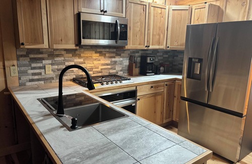 Au Train Cabin | Completely updated one bedroom cabin with a hot tub on AuTrain Lake