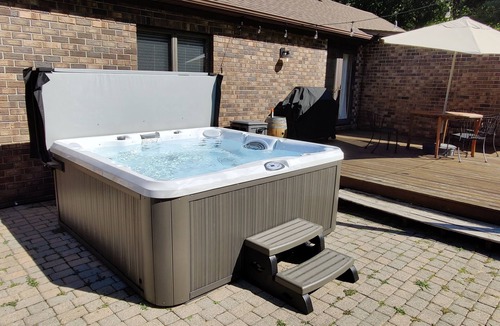 Shorewood-Tower Hills-Harbert House | Cozy cottage surrounded by trees and sounds of nature with new hot tub.