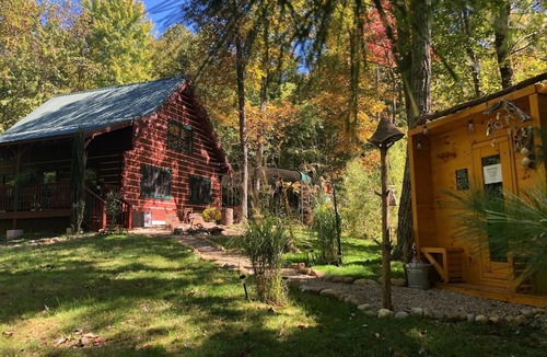 Del Rio Cabin | Cozy Log cabin tucked away in the Smokey Mountain, Pet friendly, Sauna, Hot Tub