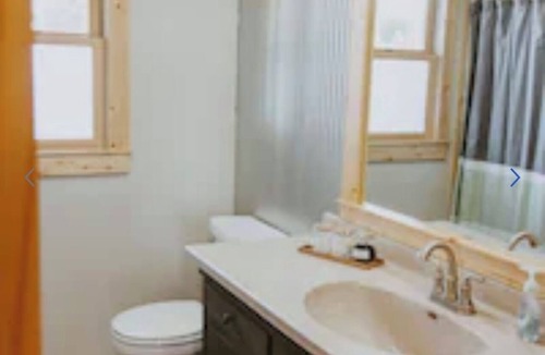 Webster Cabin | Cozy Vacation Cottage on the Lake with Hot Tub!