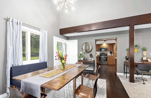 Ada House | Escape to a 4BR/2Bath wooded retreat just minutes from Grand Rapids.