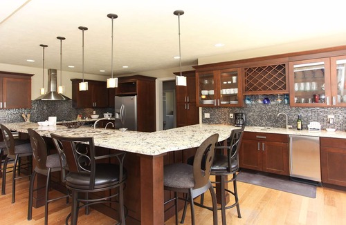 Saugatuck House | Experience luxury at Riverwalk, a 4-bedroom retreat in serene Saugatuck, MI.