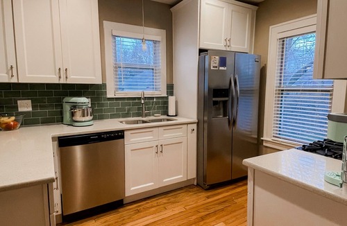 Royal Oak House | Family-sized home just a few blocks to downtown Main St King bed + fenced yard