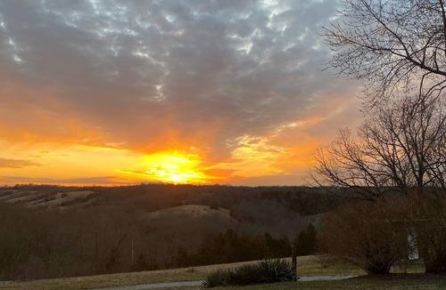 Carlisle House | Hilltop Farmhouse with 3 sunrise- sunrise porches overlooking hills and holler