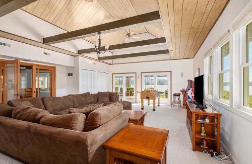 Newaygo House | Lakeside Getaway with Dock, Firepit, Grill