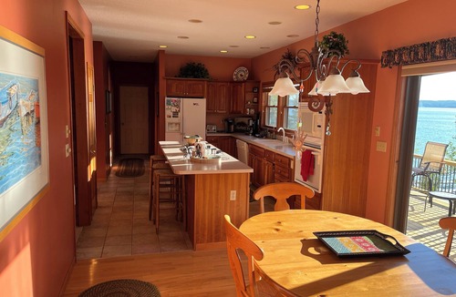 Kewadin House | "Luxurious 4BR/4BA Retreat on Torch Lake - Perfect for Families"