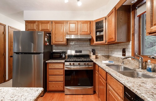 Lake Ann House | Majestic Maple Escapes | Hot Tub | Firepit | Deck | Large Yard