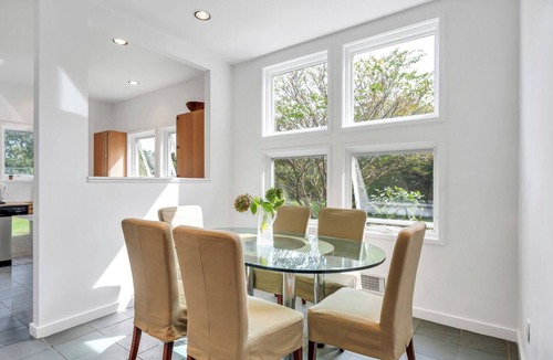 Bridgehampton House | Modern Bridgehampton retreat w expansive yard, heated pool, close to town.