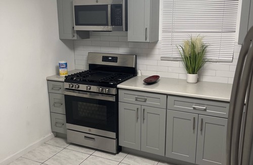 Roosevelt House | Peaceful Gathering Modern Kitchen & Living space, Huge discounts are available