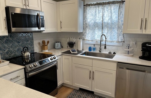 Manistee House | Private Hot Tub, Outdoor TV, near Downtown & Lake Michigan Beaches!