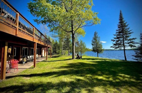 Presque Isle Cabin | Private Lakefront Stay with Beautiful Sunset Views, Kayaks, & Kid’s Area