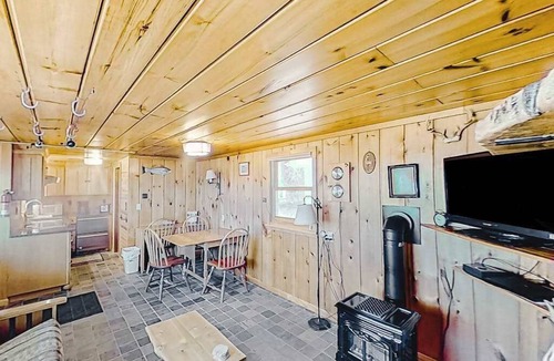 Lake Township House | Rustic getaway on Crystal Lake w/firepit, guest house & private dock