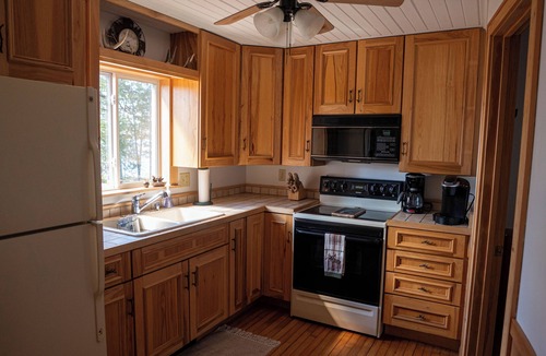 Solon Springs Cabin | Rustic Lake Front Log Cabin: Stunning Sunset Views, Private Dock & Fast WiFi
