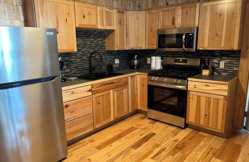 Au Train Cabin | Six bedroom lake front cabin with hot tub and outdoor fire pit