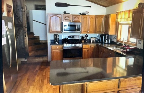 Manchester House | Spectacular Cobbossee Lakefront with Hot Tub & Dog Friendly