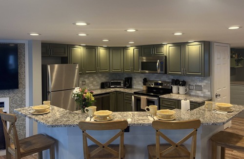 Conesus House | Sunset Lakefront Family Retreat - Dock, Hot Tub, Kayaks - Sleeps 12