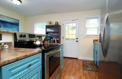 Navy Point House | The Bungalow. Walk to Bayou! Backyard Family Fun!