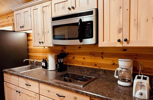 Hammond RV Rental | The Perch- Cliffside cabin overlooking Black Lake