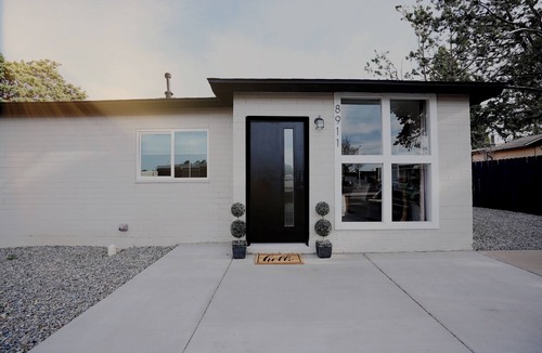 Northeast Heights House | The White House. Stylish Uptown Retreat near Dining & Shopping