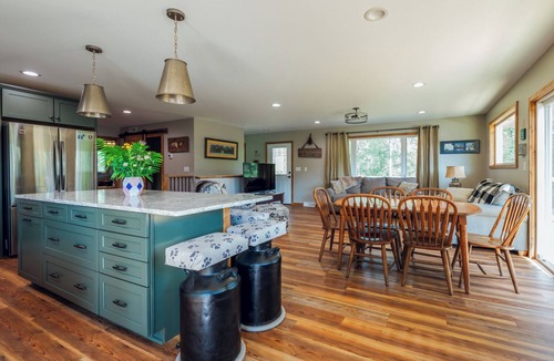 Ingalls House | Unhurried Rapids Hideaway; charming 2 bedroom home with lower level bunk area.