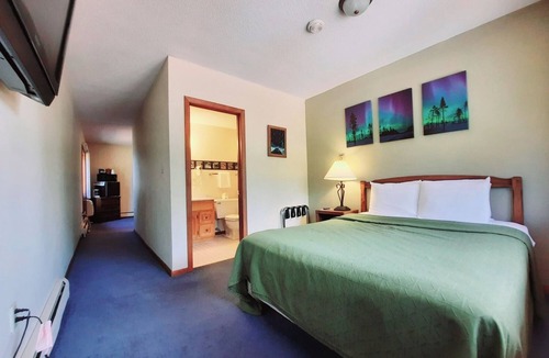 Ironwood Cabin | Unique Northern Lights Themed Guestroom inside the Lodge at North Ironwood Acres for up to Four people. 2 Queens, 2 Bathrooms. Dog Friendly resort!