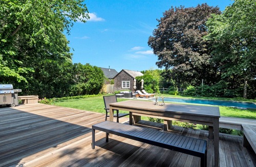 Village of East Hampton House | Upbeat traditional-style home with a private pool, open-floor plan, pool...