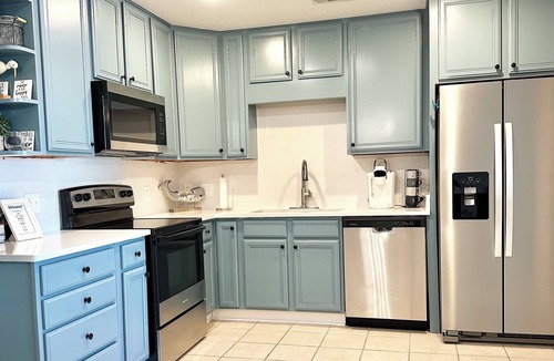 Darien Condo | Wake Up on the River! Walk to charming Downtown Darien. w/boat slip