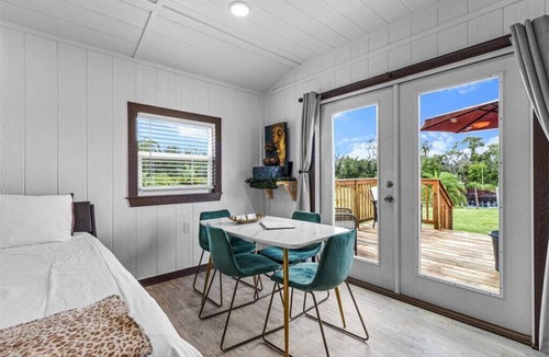 Sugarmill Woods Cabin | Waterfall Suite at Zen at the Palms with a Private Hot Tub by the Waterfall!