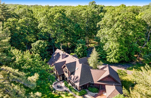 Three Lakes House | Waterfront elegance with private beach & hot tub - dogs welcome