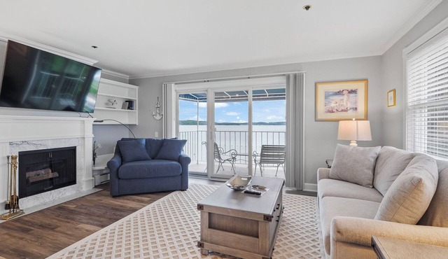 215 Water Street | Balcony Over Lake Charlevoix | Waterfront Stay | Fireplace