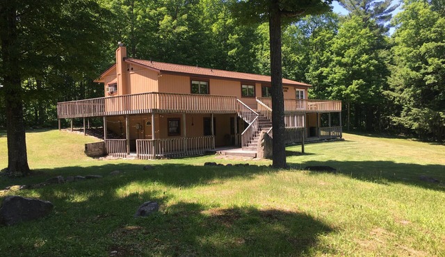Atv-Snowmobile Trail, sits on the Laughing Whitefish River, sleeps 16 people.